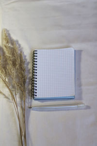 High angle view of coffee on table against white background