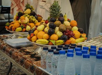 A large plate with fruits displayed in saudi wedding