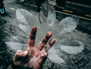 Close-up of man working in water