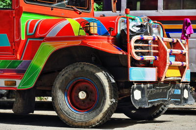 Multicolored truck park on road