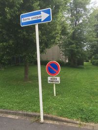 Information sign on wooden post