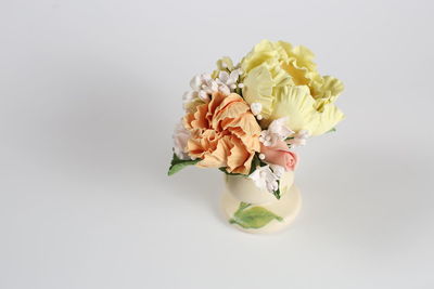 Close-up of bouquet against white background