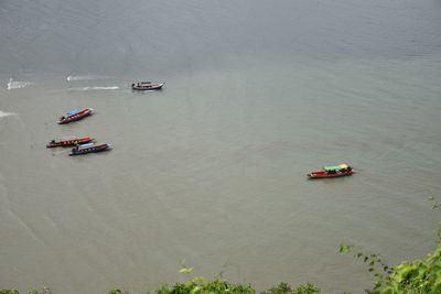 High angle view of boat sailing in sea