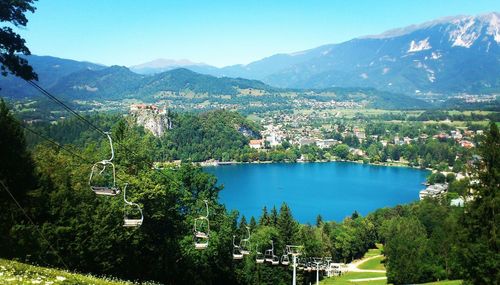 High angle view of trees and mountains against sky