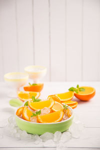 Close-up of fruits in bowl on table