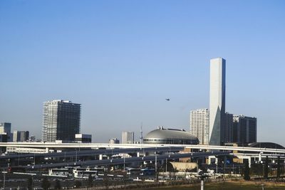 View of cityscape against clear sky