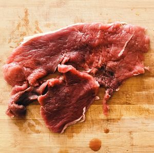 Close-up of meat on cutting board