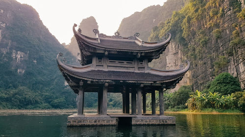 View of temple against lake