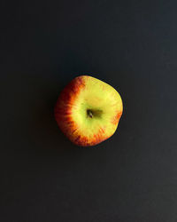 High angle view of apple against black background