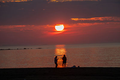 Warm summer sunrise over the ocean in new hampshire.