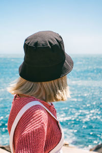 Rear view of woman wearing hat