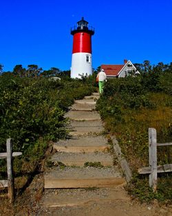 Lighthouse against clear blue sky