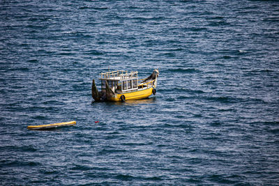 High angle view of sailboat on sea