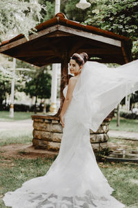Woman standing in front of building