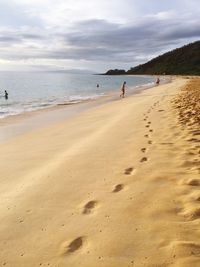 Scenic view of beach against sky