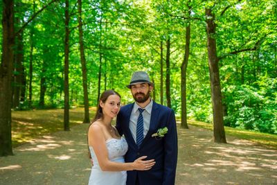 Young couple standing in forest