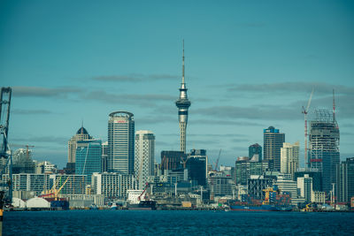 Modern buildings in city against sky