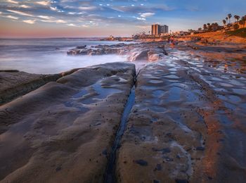 Rocky beach at sunset