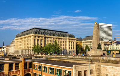 Buildings against sky in city