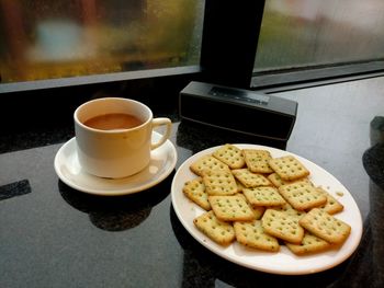 Close-up of coffee served on table