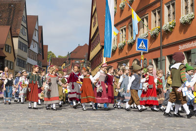 People on street in city