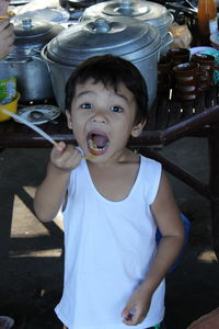 Portrait of cute boy playing