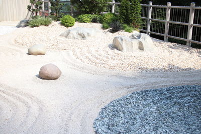 High angle view of stones on sand