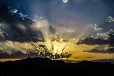 Scenic view of silhouette mountain against sky during sunset in sardinia, nodu pianu, golfo aranci