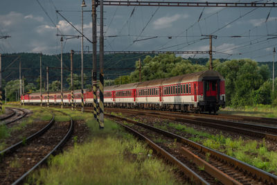 Train on railroad track against sky