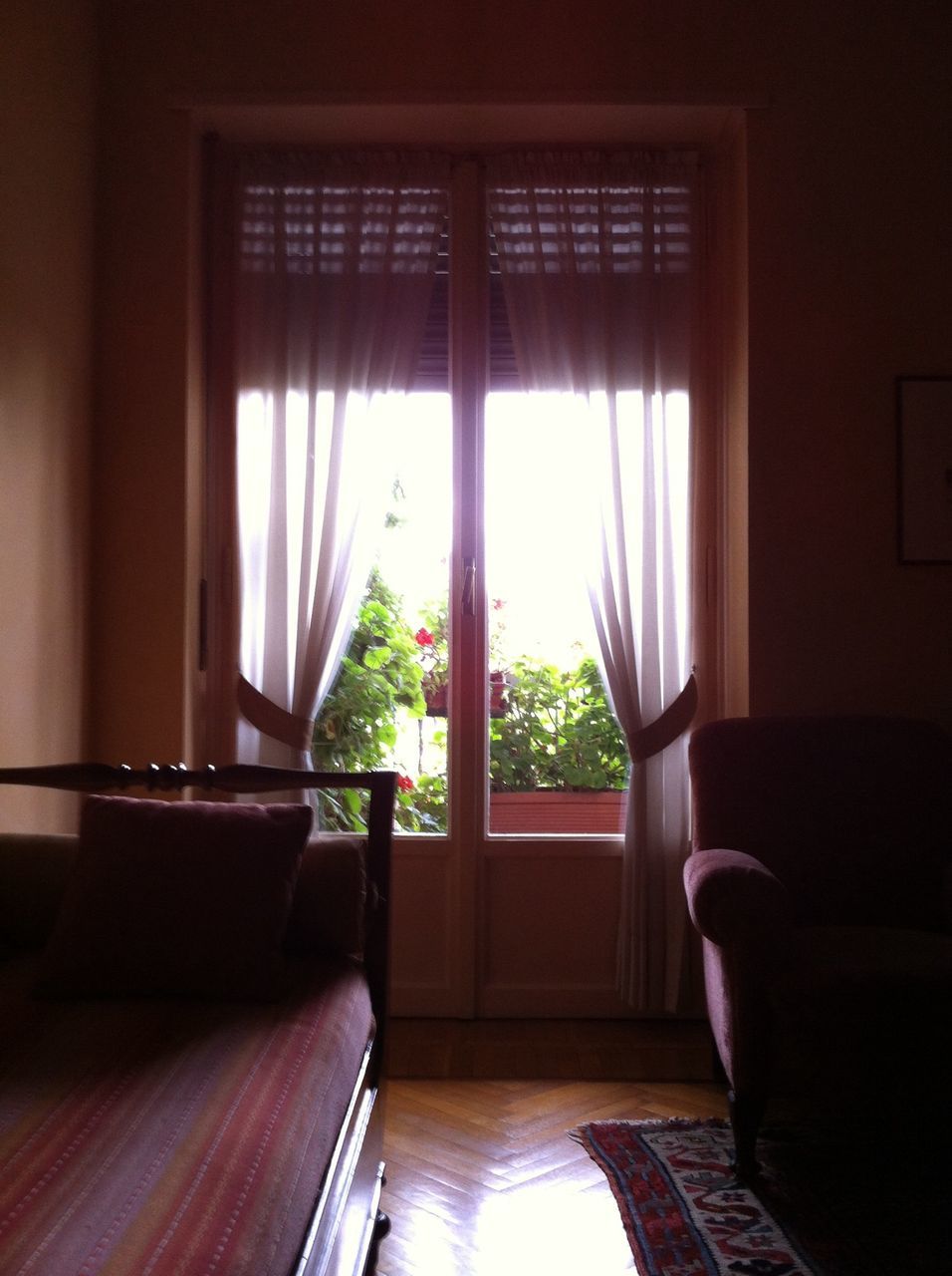 window, indoors, glass - material, home interior, house, transparent, curtain, absence, architecture, chair, built structure, potted plant, window sill, sunlight, open, table, empty, day, door, no people