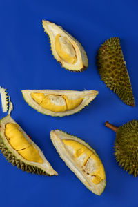 High angle view of bananas against blue background