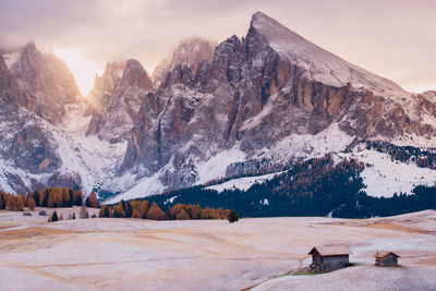 Scenic view of snowcapped mountains against sky during winter