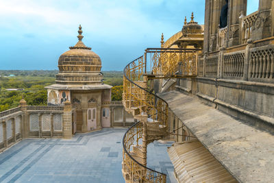 Exterior of temple building against sky