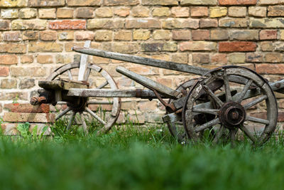 View of abandoned wheel on field