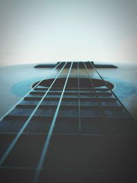 Guitar against sky