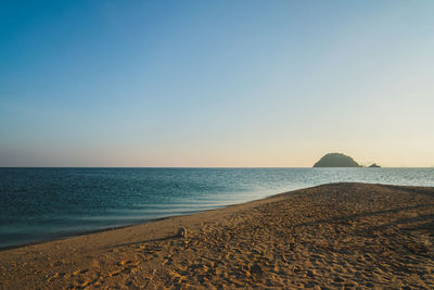 Scenic view of sea against clear sky during sunset