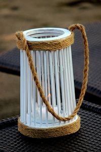 Close-up of rope tied on wooden table