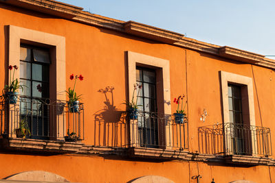 Orange balconies in santiago de queretaro, mexico