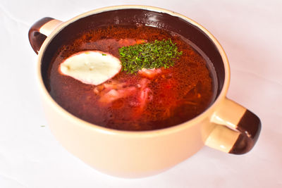 High angle view of soup in cup on table