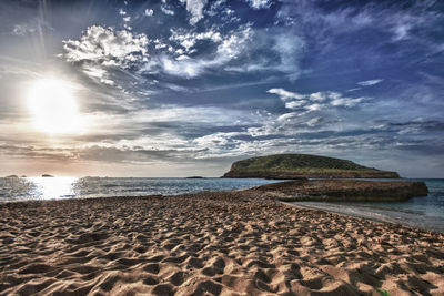 Scenic view of beach against sky
