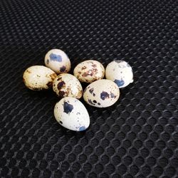 High angle view of pebbles on table