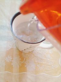 High angle view of coffee cup on table