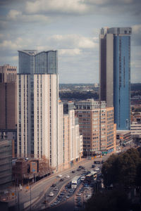 Modern buildings in city against sky