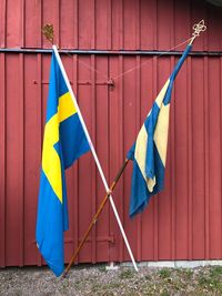 Flags against closed door