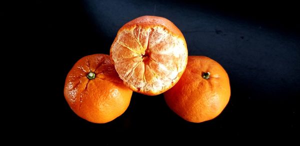 High angle view of orange fruit on table