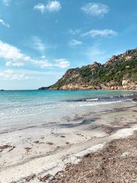 Scenic view of beach against sky