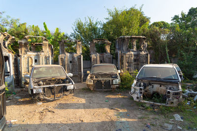 Abandoned car on field