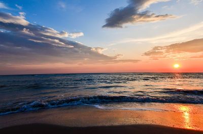 Scenic view of sea against sky during sunset