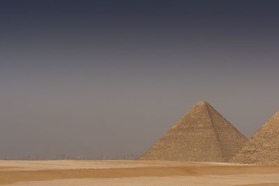 View of desert against clear sky