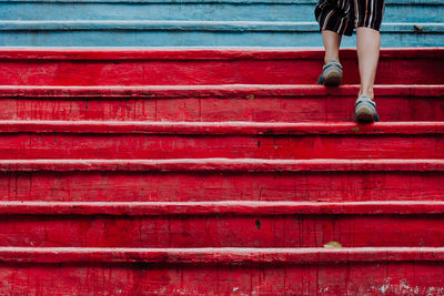 Low section of child on walking on steps